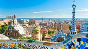 a beautiful view of a city of spain with ocean view afar