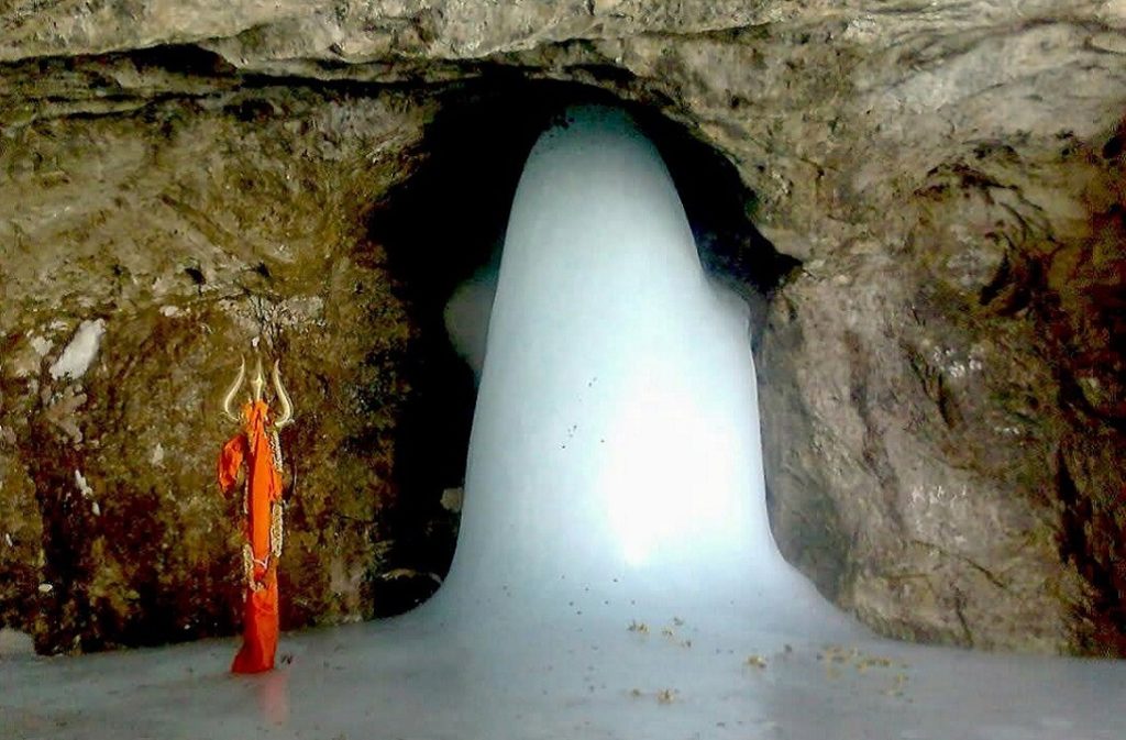 ice shivling with a trident beside
