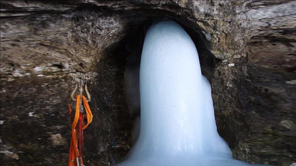ice shivling with a trident beside