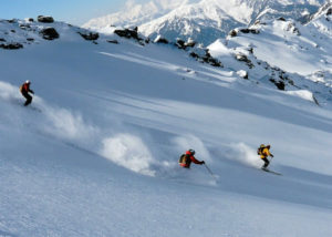 people skiing in the mountains