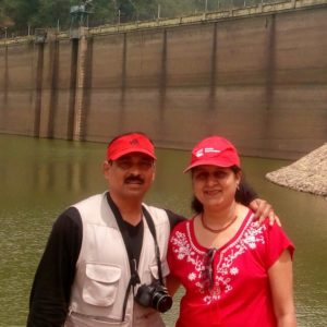 couple in front of a dam